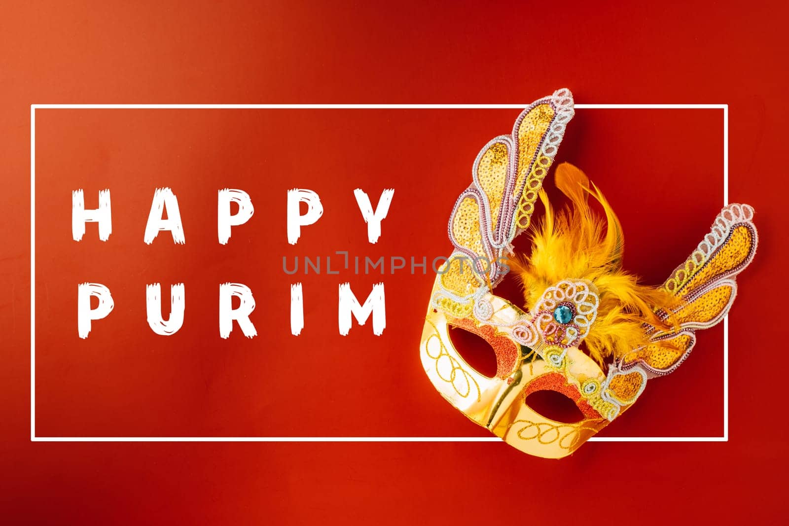 Happy Purim carnival. Carnival mask for Mardi Gras celebration isolated on red background with copy space, jewish holiday, Purim in Hebrew holiday carnival ball, Venetian mask, masquerade accessory