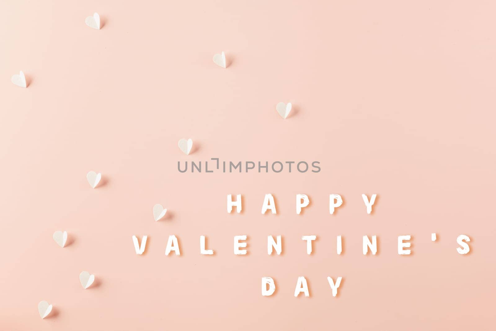 Happy Valentines Day background. Top view flat lay of paper elements cutting white hearts shape flying on pink background with copy space, Happy Mother's Day, Banner template design of holiday
