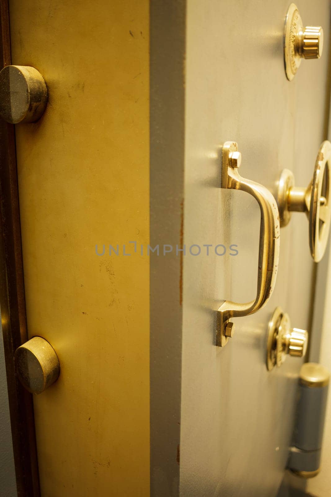 Close-up of an old bank safe with combination lock