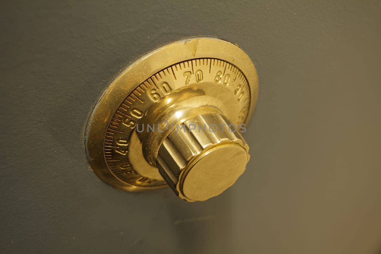 Close-up of an old bank safe with combination lock