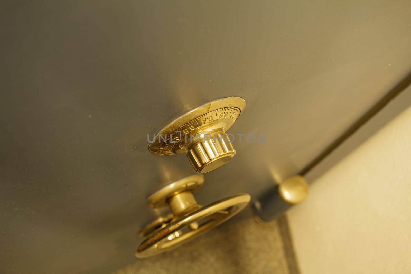 Close-up of an old bank safe with combination lock