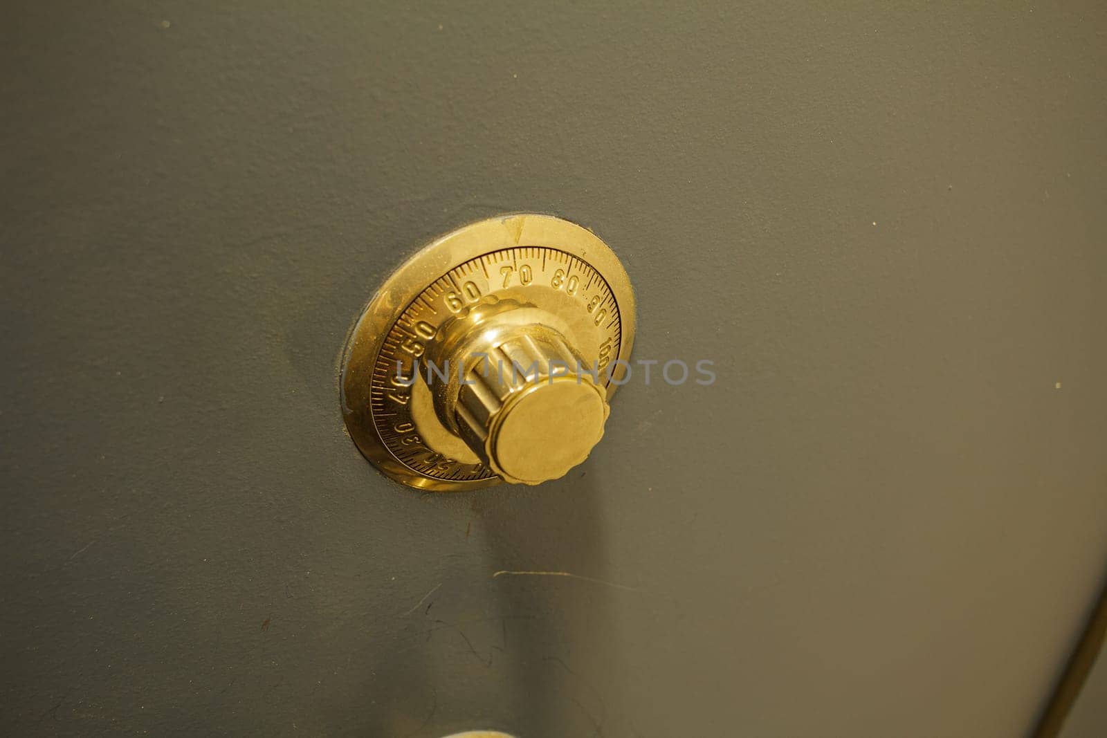 Close-up of an old bank safe with combination lock