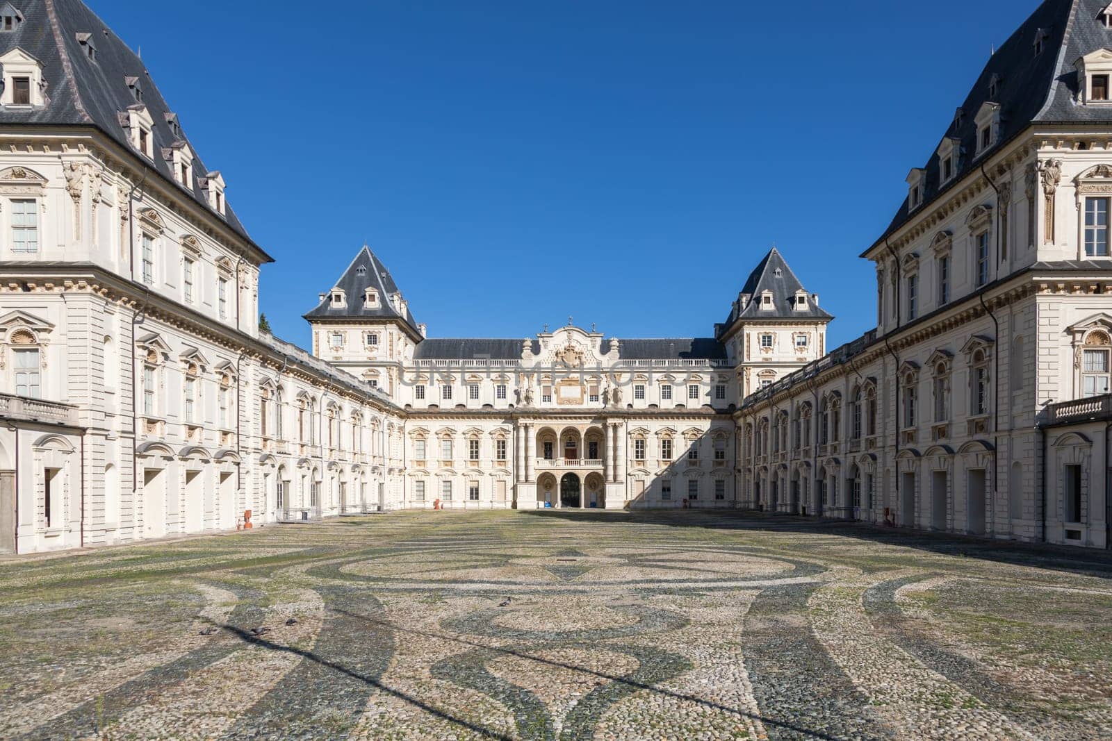 Turin, Italy - February 2023: castle exterior. Historical landmark with blue sky and daylight