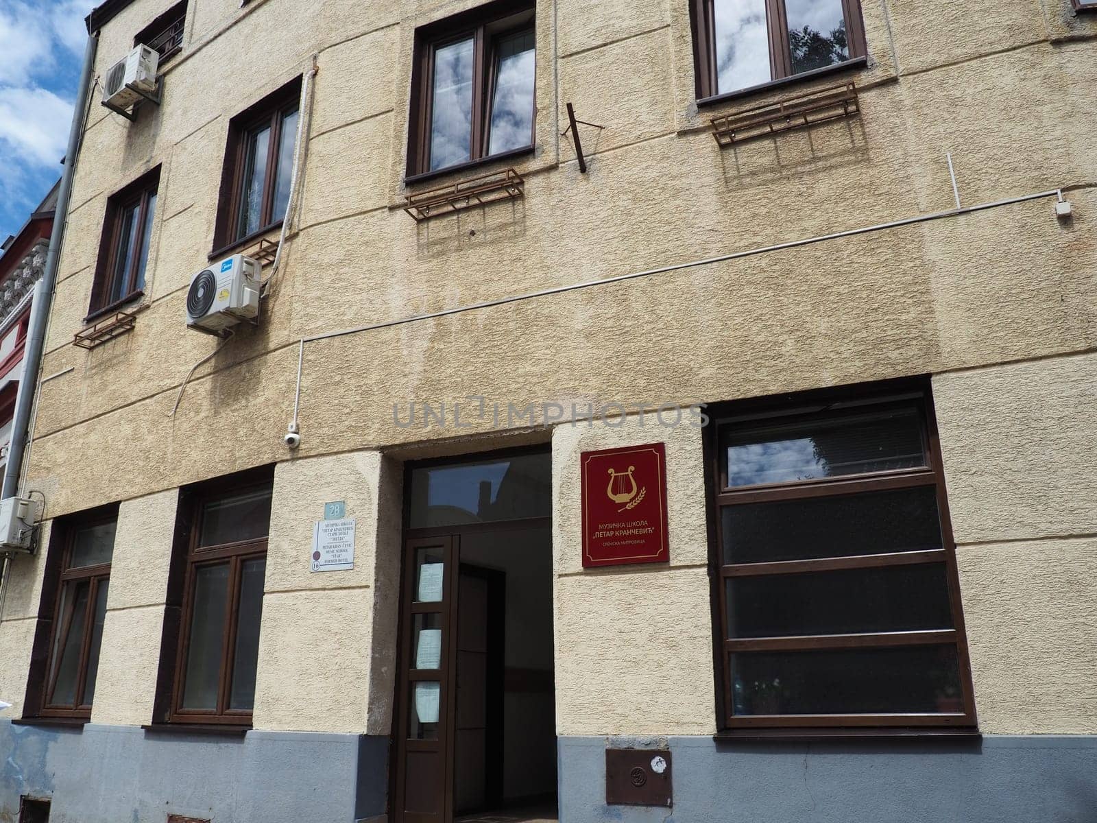 Sremska Mitrovica, Serbia June 5, 2021. The building of the Music School named after Petar Krancevic, it is also an old hotel. Facade. Educational activities. Musical education.