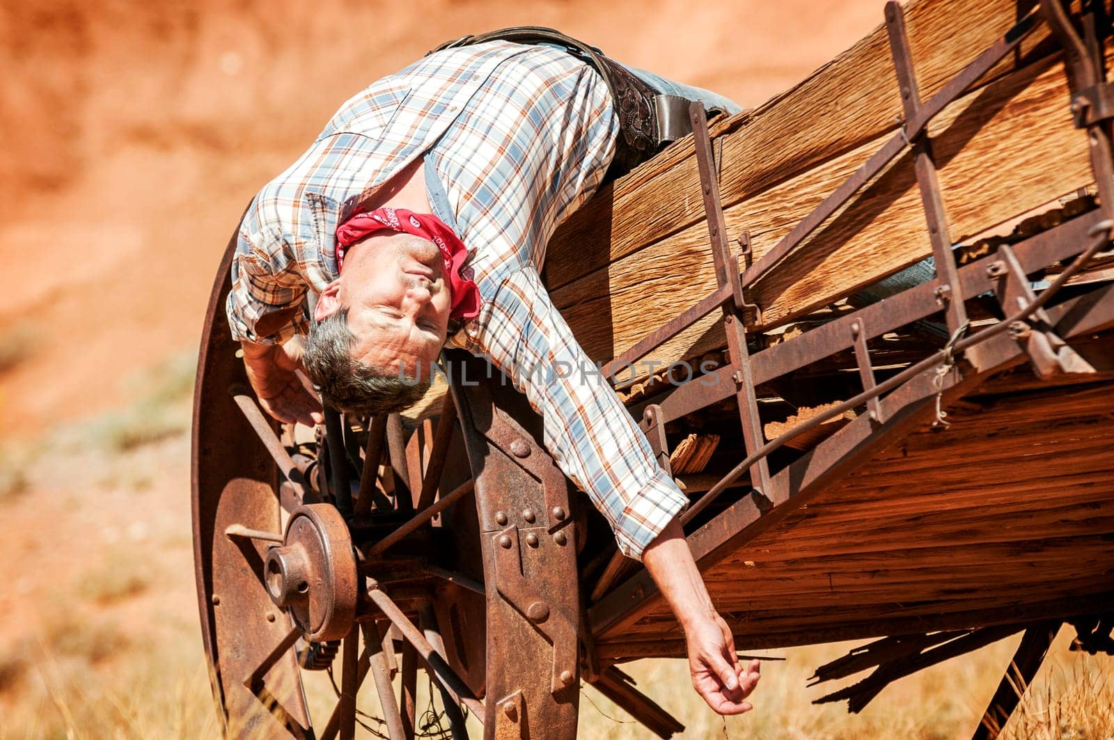 SOUT WEST - A cowboy takes time to rest and reflect.