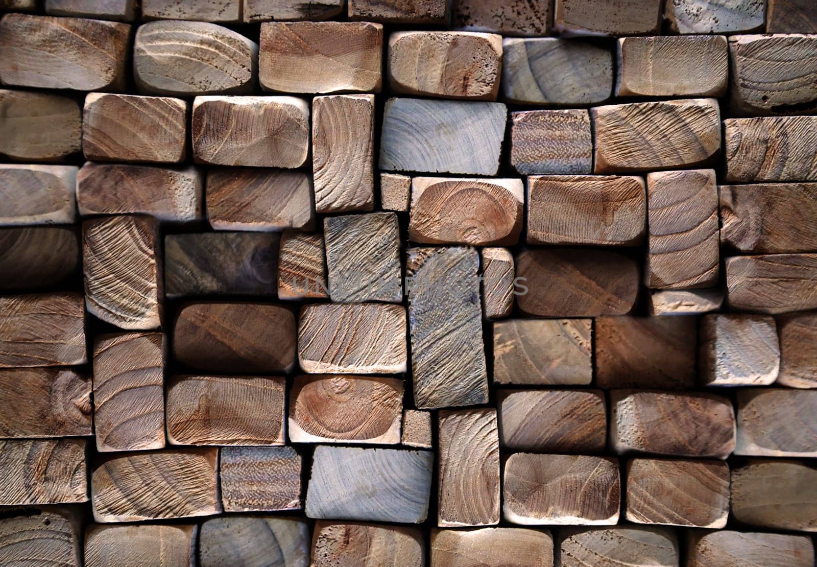 A texture of wood. Many stacked wooden slats from the front side.
