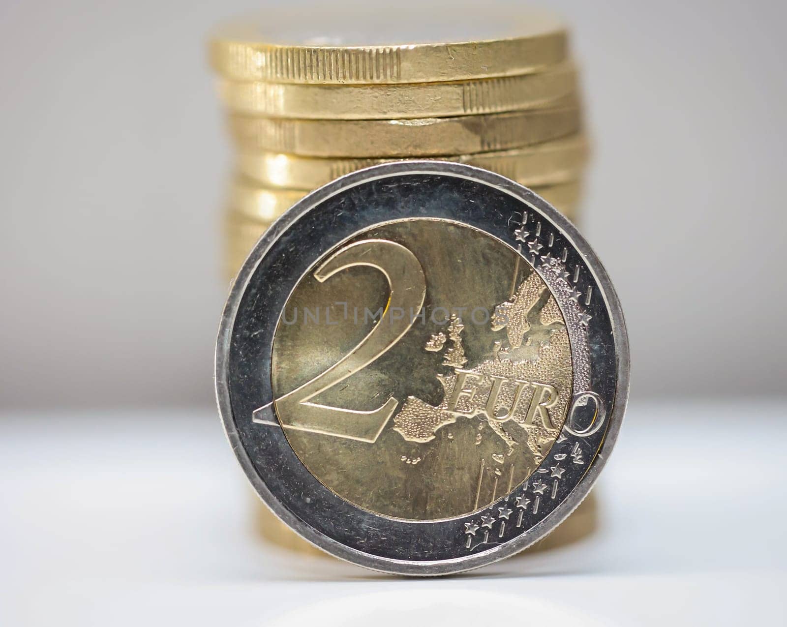 Two euro coins, close-up of a coin with the value of 2 euros.