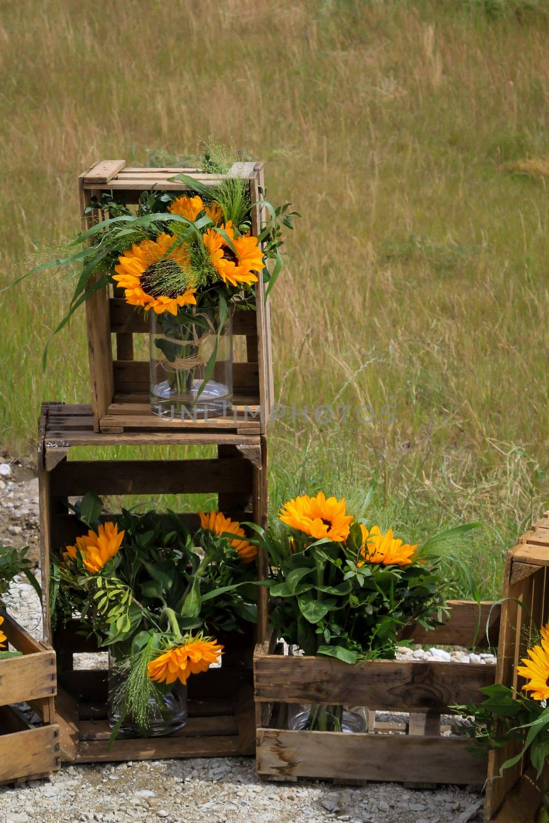 A festive decoration with beautiful yellow sunflowers.