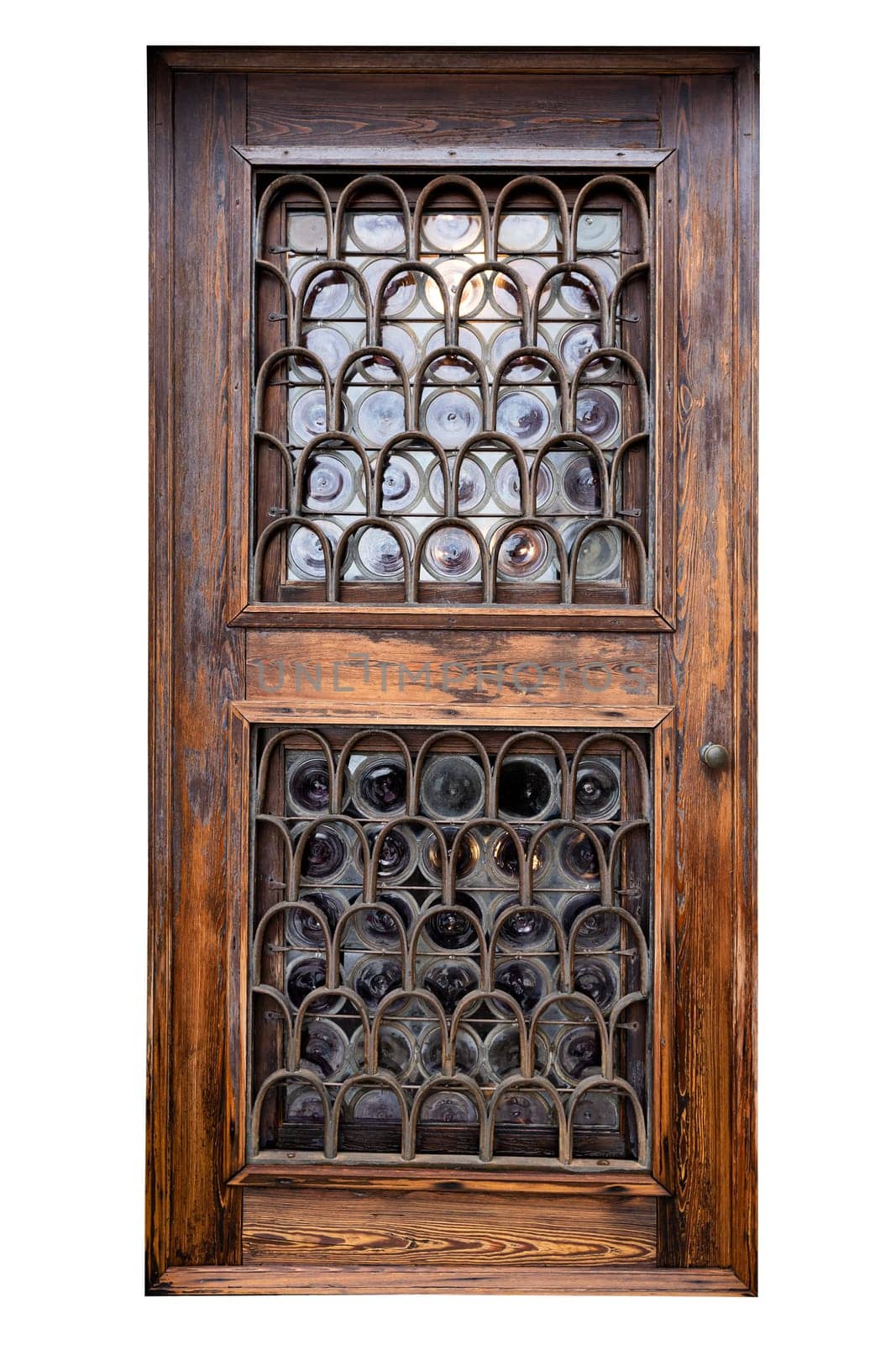 front view closeup of vintage wooden door with glass windows and metallic decorative railing isolated on white