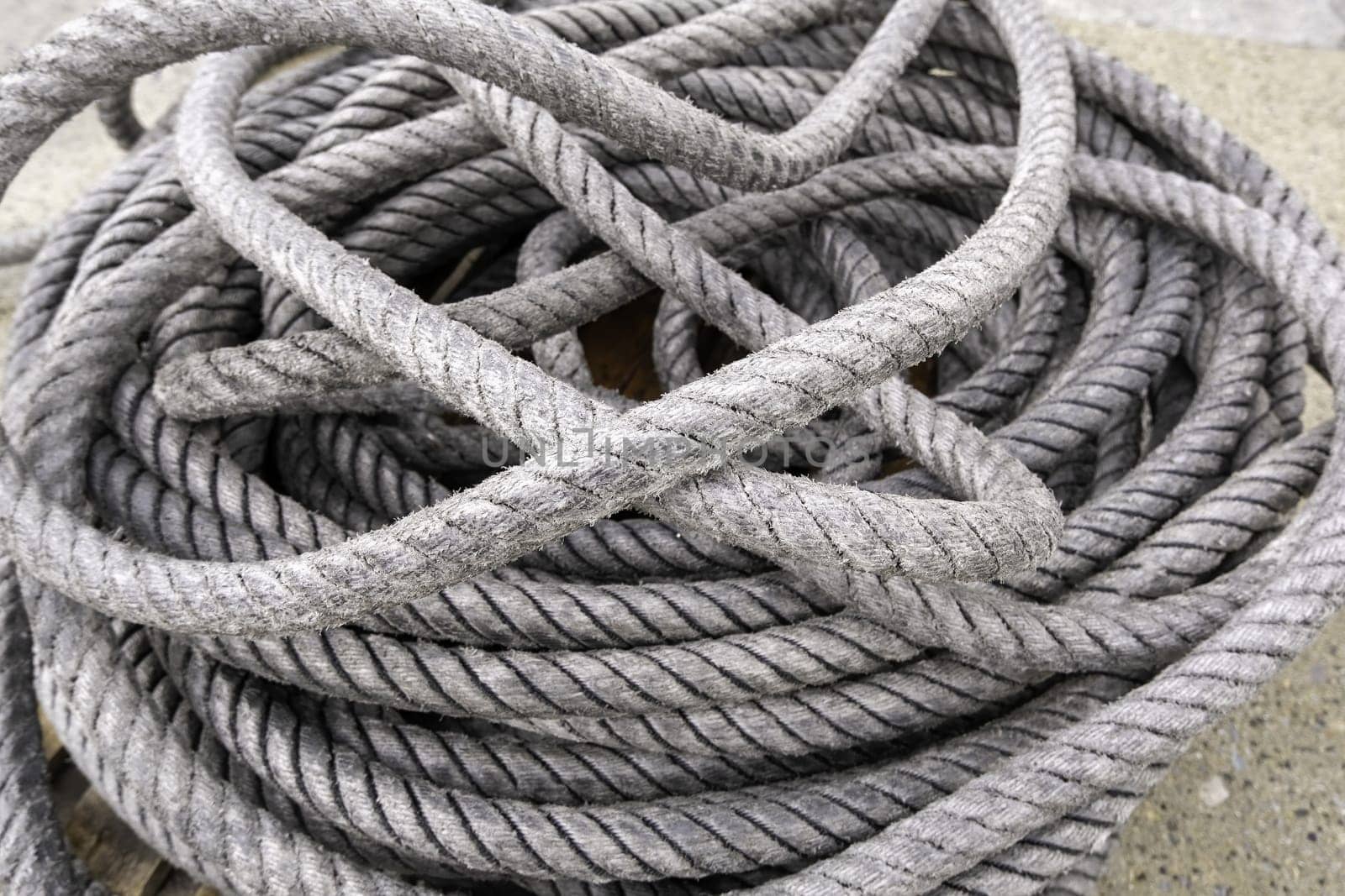 Detail of old and damaged rope for the fishing industry