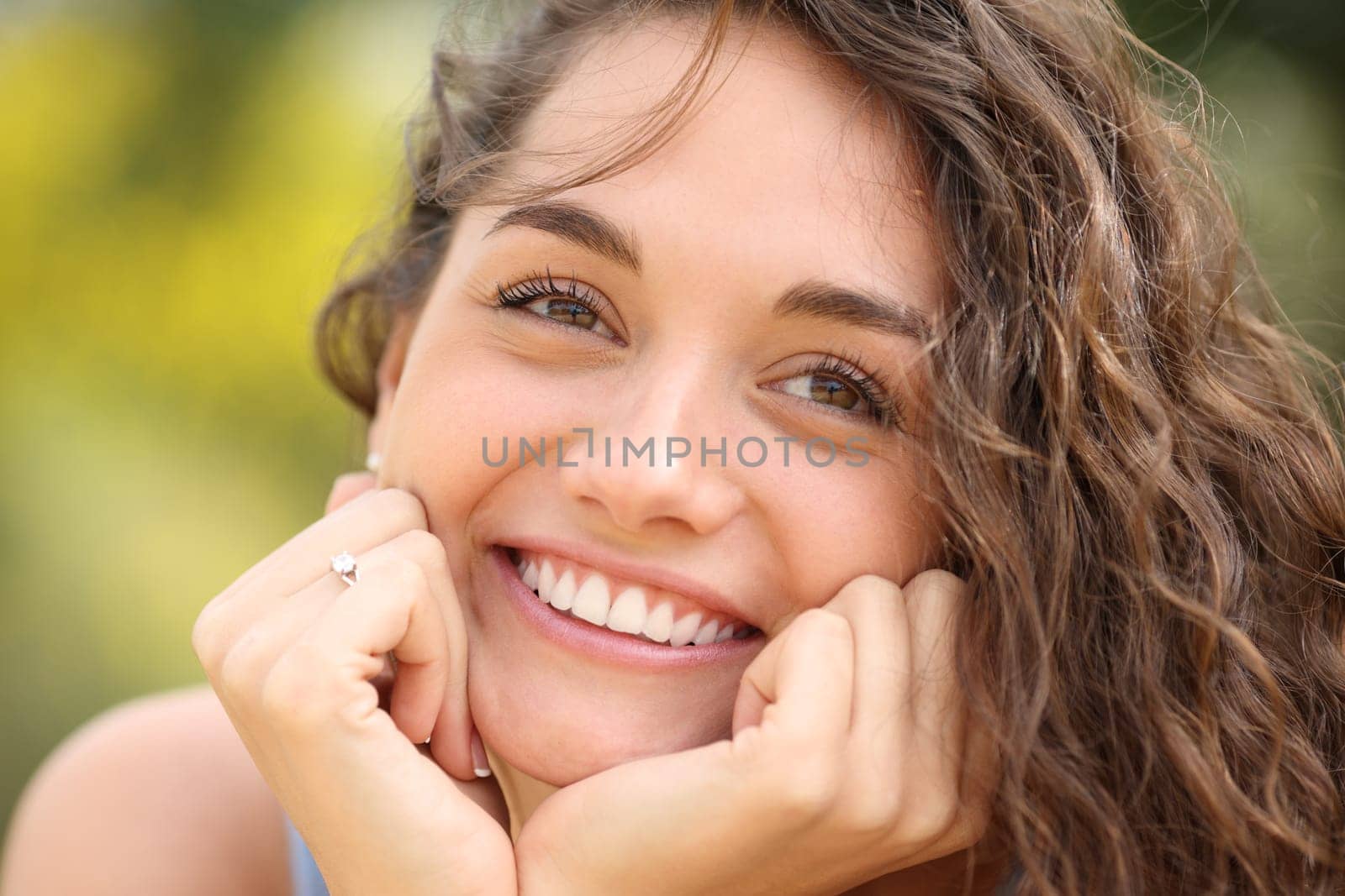 Front view of a happy fiancee smiling looking away