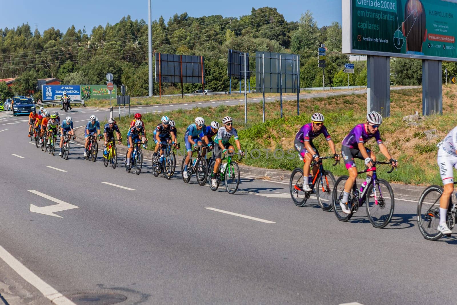 Braga, Portugal : 12 August 2022, - Cyclists taking part in stage Santo Tirso - Braga in Volta a Portugal race, Braga, Portugal