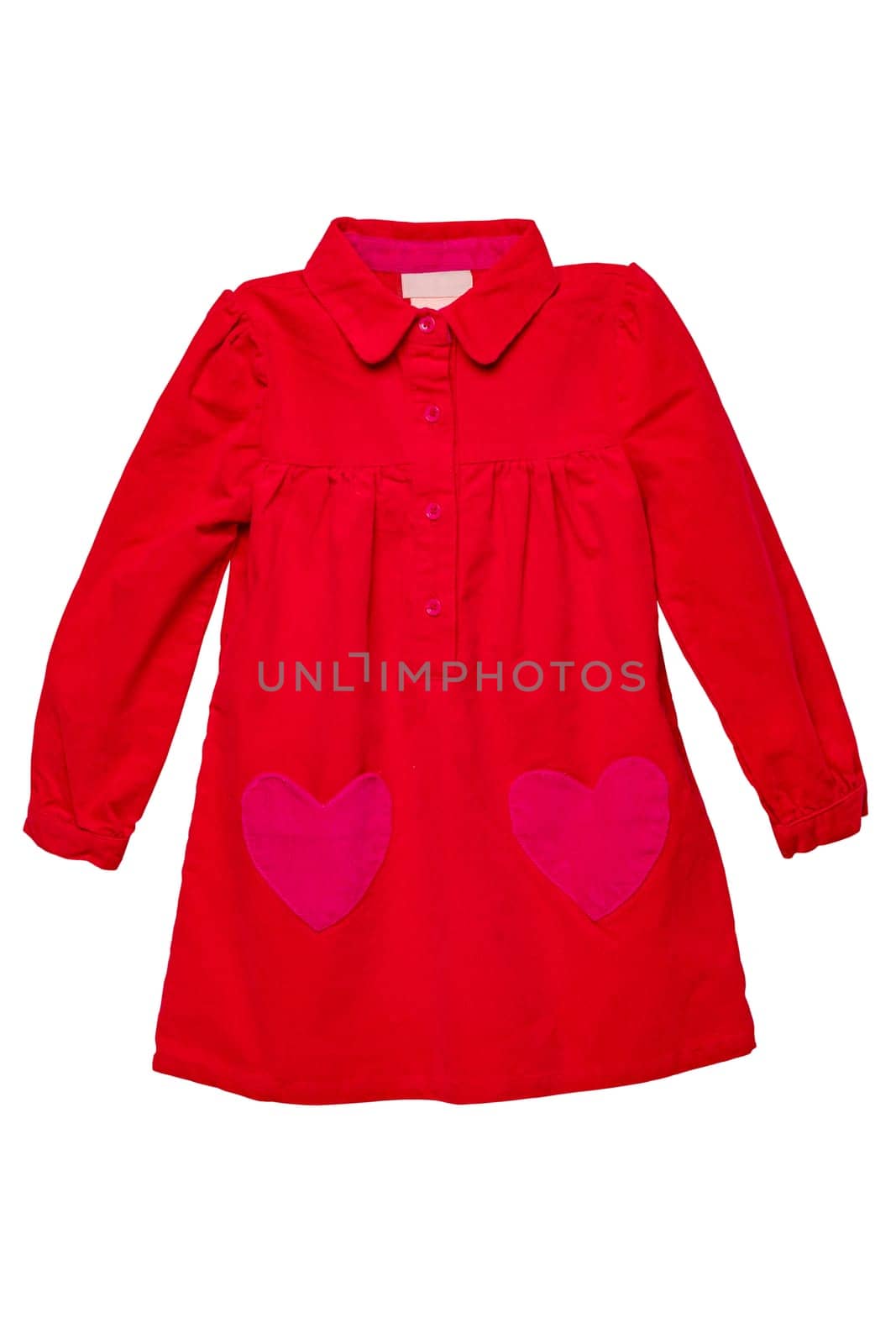 Summer dress isolated. A beautiful red girl's dress with attached heart shaped pockets and long sleeves isolated on white. Kids spring and autumn fashion.