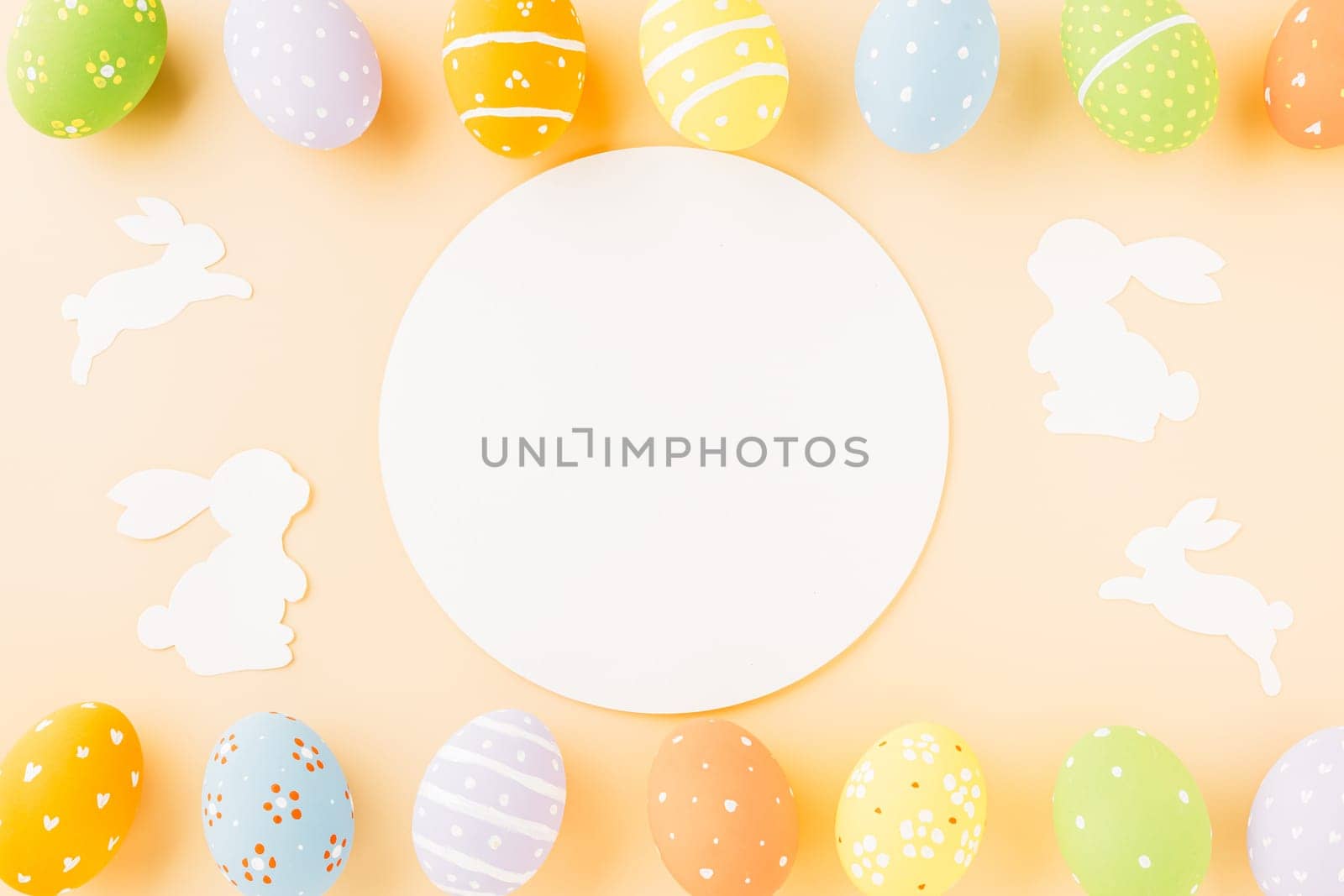 Overhead easter eggs with rabbit paper cut and circle white paper isolated on pastel background, Funny decoration paper round blank, Happy Easter Day, Creative banner web design holiday background