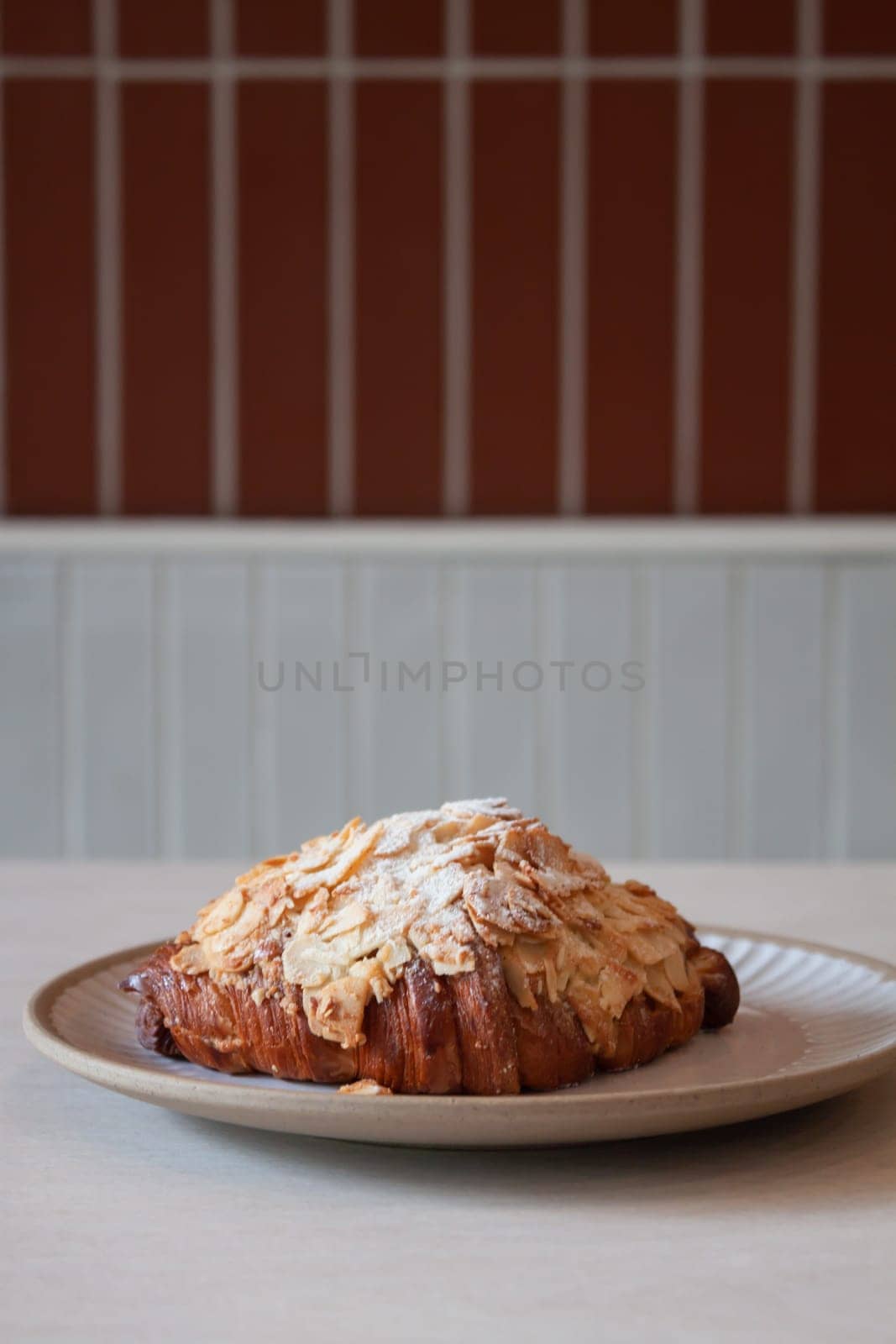 Freshly baked French croissant served in coffee shop, stock photo