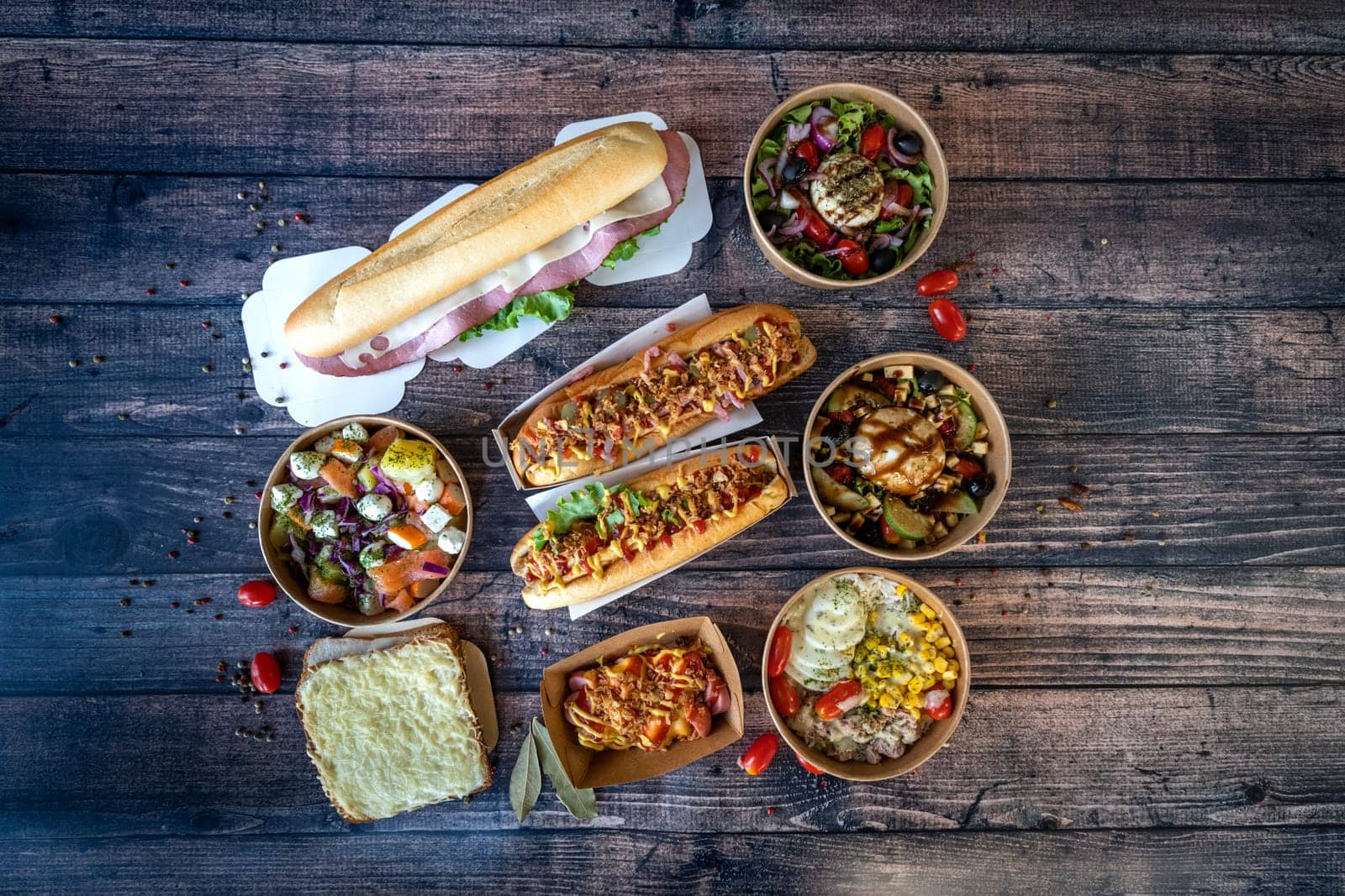 mixed fast food ready to be eat on a wooden table