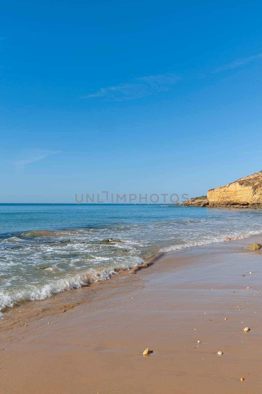Maria Luisa beach with rock formation in Albufeira, Algarve, Portugal.................