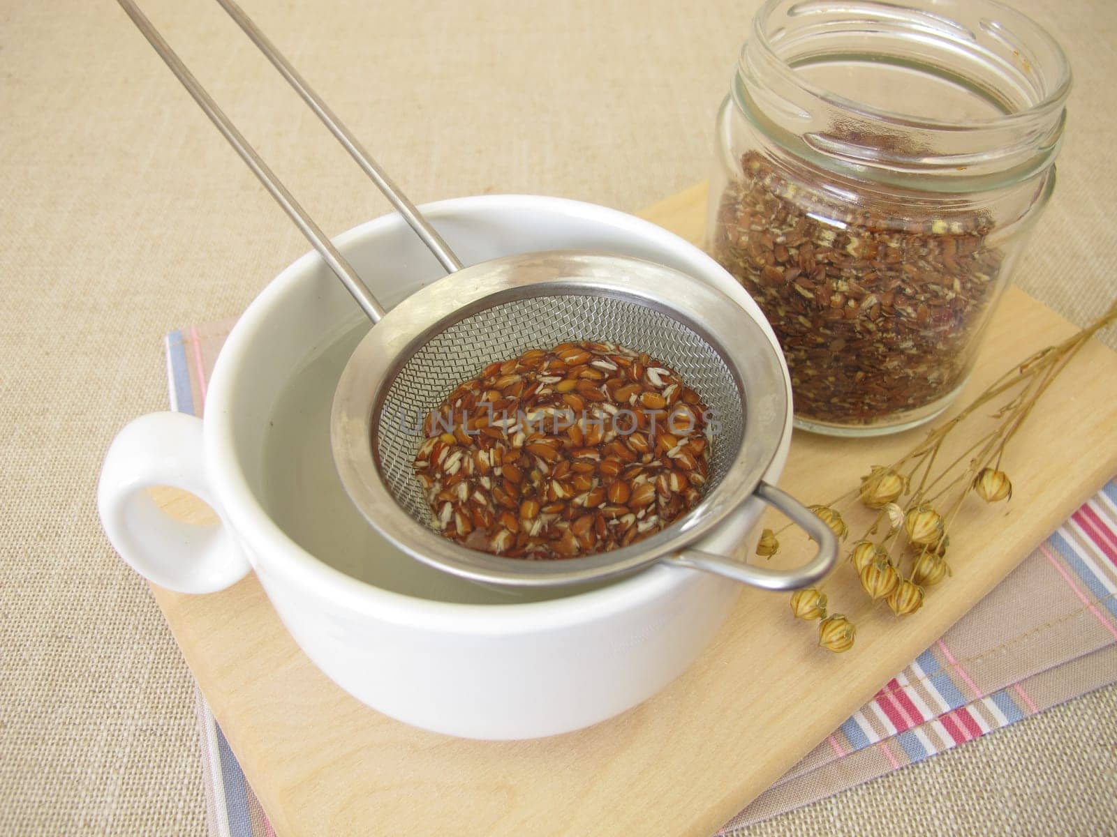 Flaxseed tea, a cup of tea from brown flax seeds