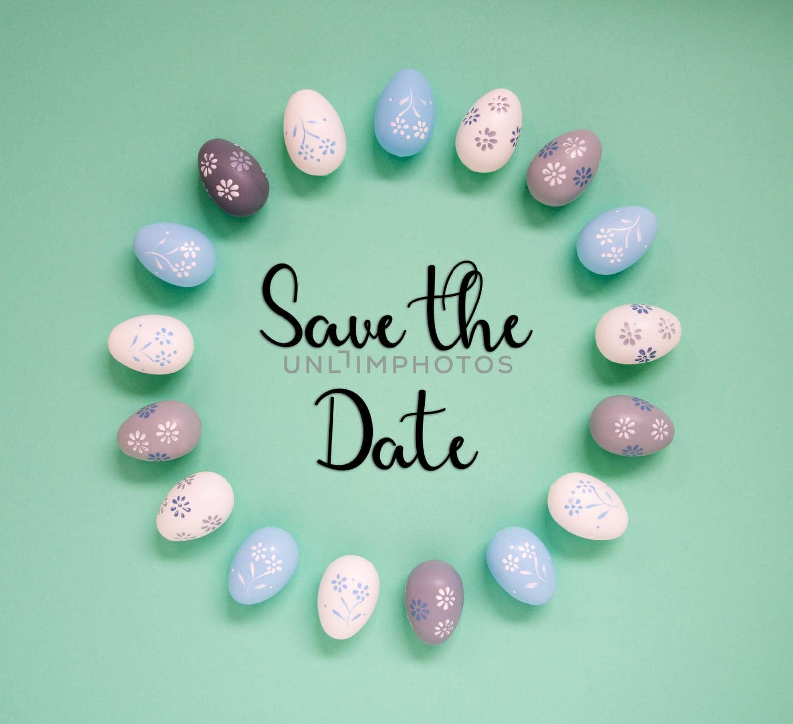 Flat Lay With English Text Save The Date. Easter Egg Arrangement, Decoration And Ornament. Light Green Paper Background