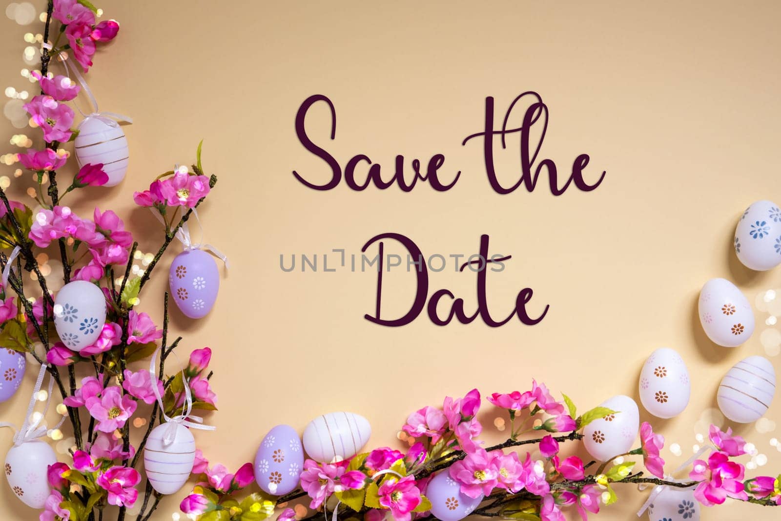 English Text Save The Date On Beige Background. Pink And Purple, Shiny And Bright Spring Flower Arrangement With Easter Egg Decoration.