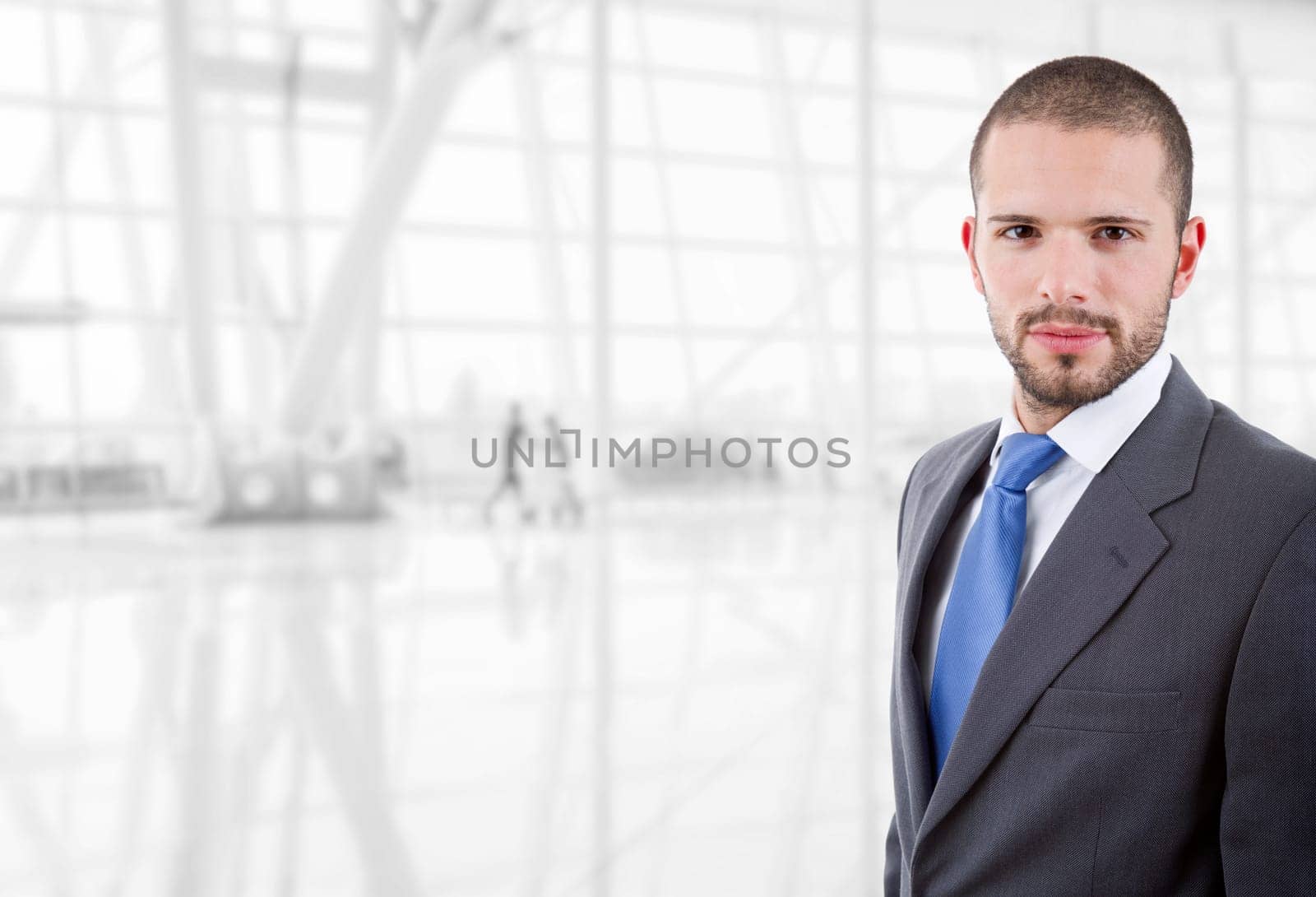 young business man portrait at the office