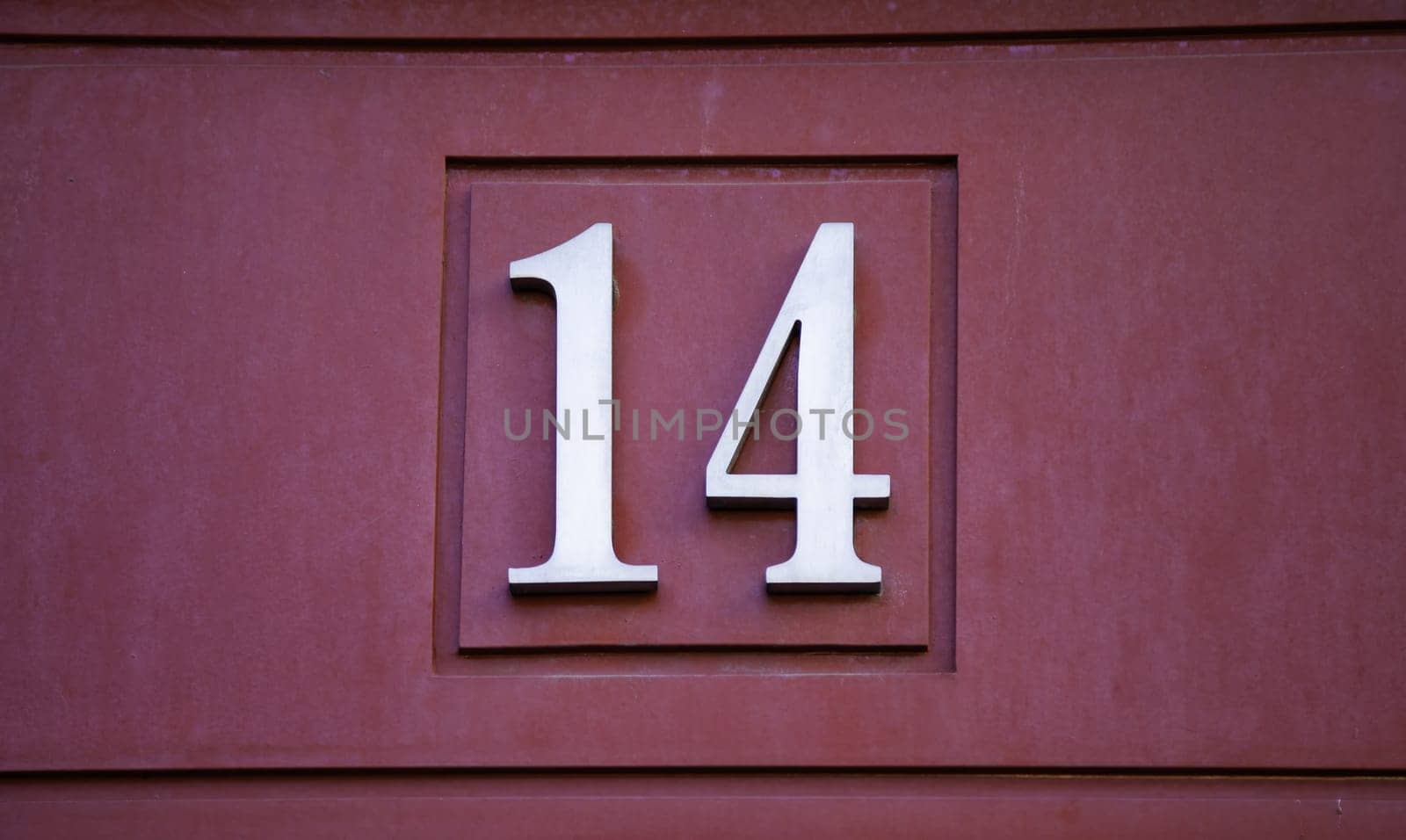 Detail of even number of information on a facade in the city, address