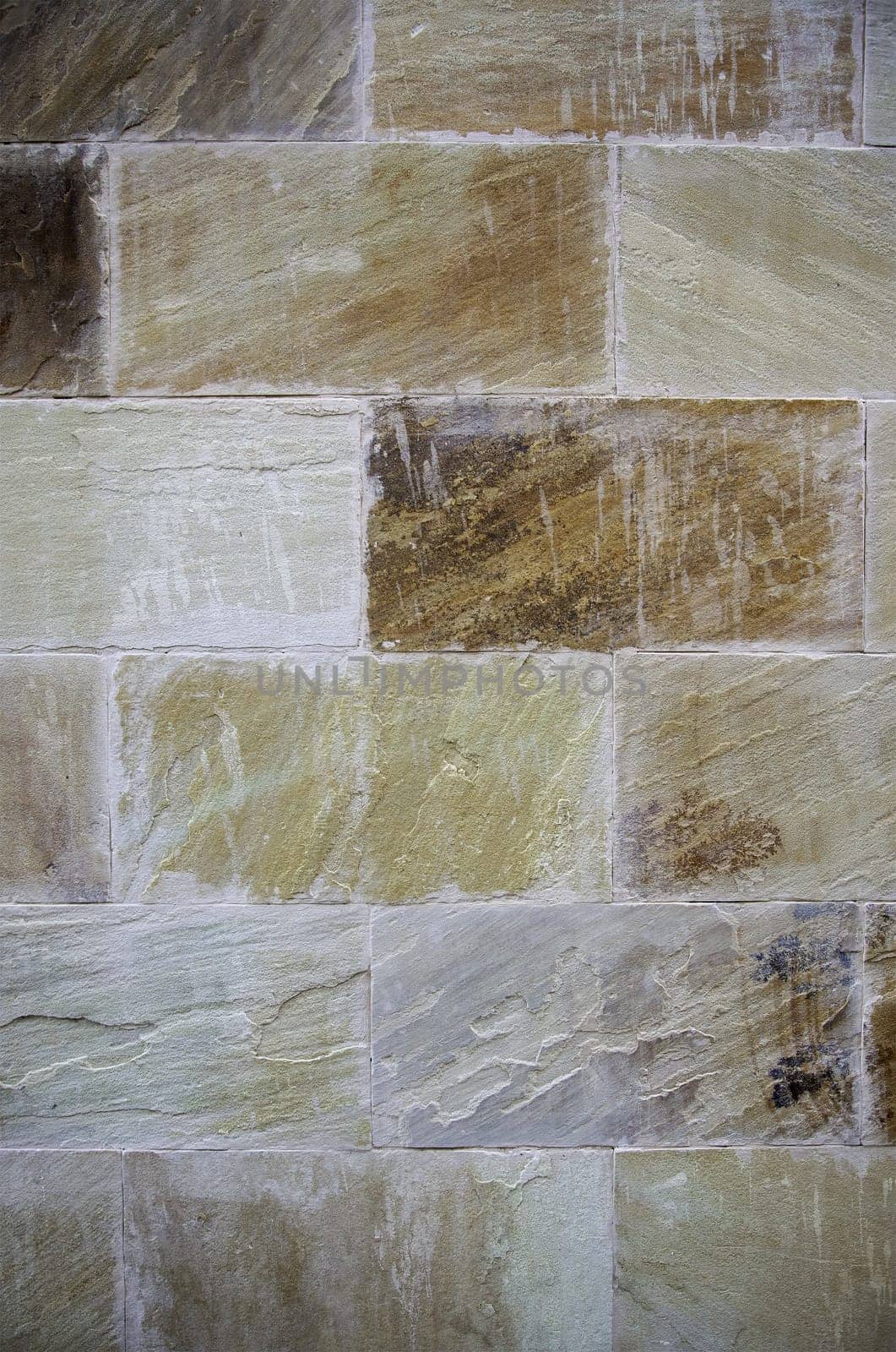 Detail of wall covered and decorated with natural stone, architecture