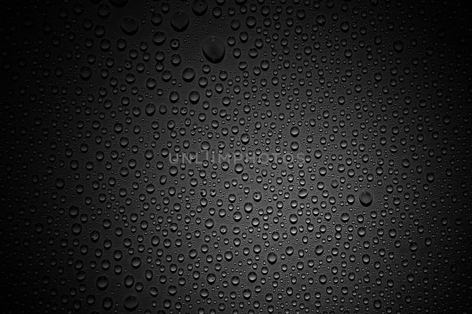 Dark background texture with water drops