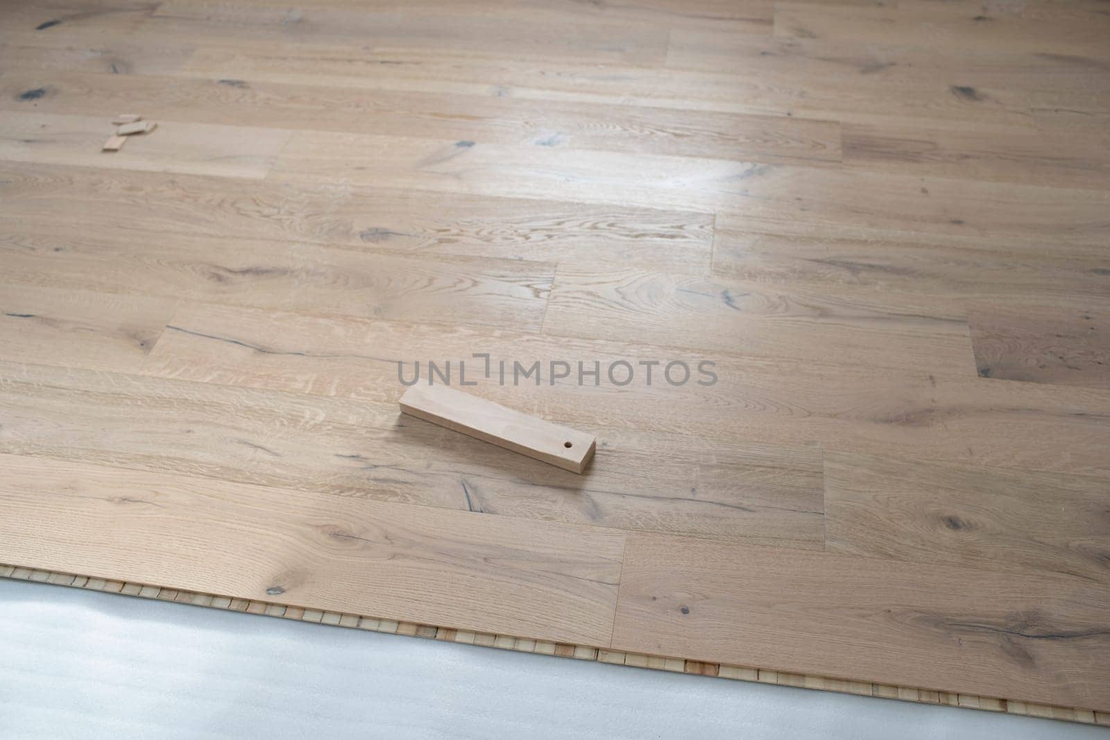 parquet floor laying in a new room, loft, new house