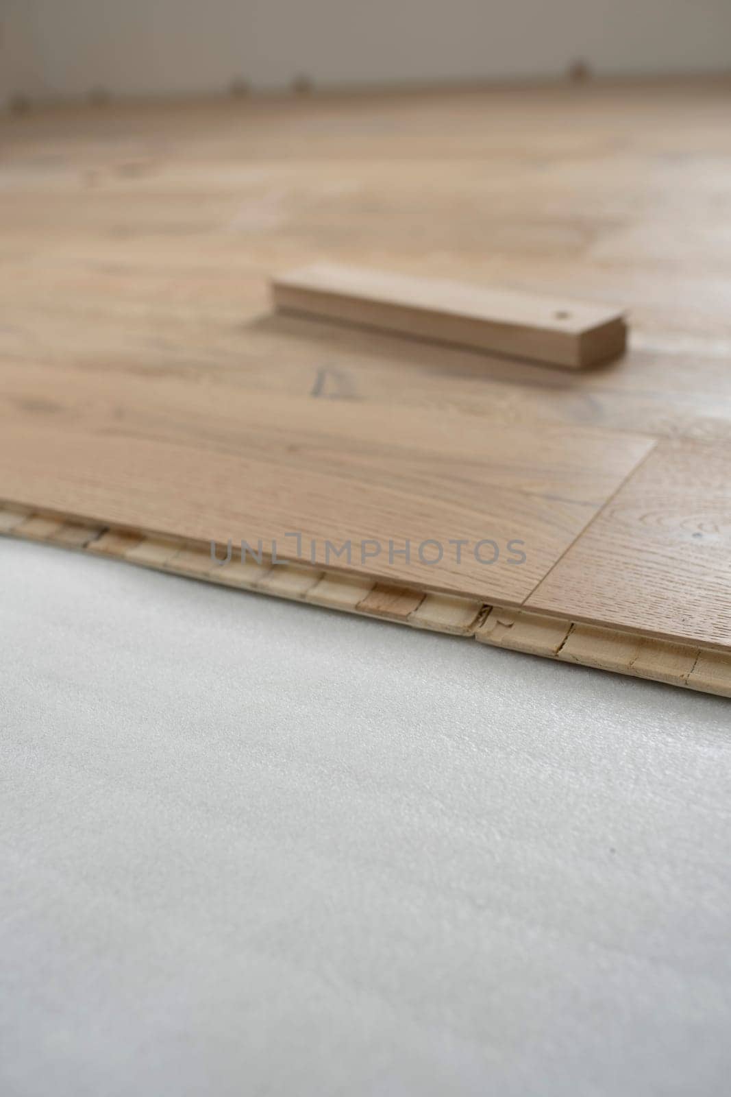 parquet floor laying in a new room, loft, new house