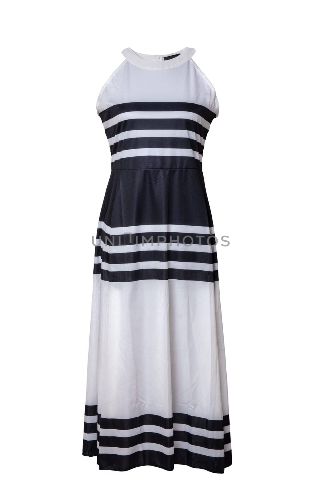 Dress isolated. Closeup of colorful elegant stylish black and white striped sleeveless summer dress or sundress on a mannequin. Clipping path. Women, girls summer fashion.