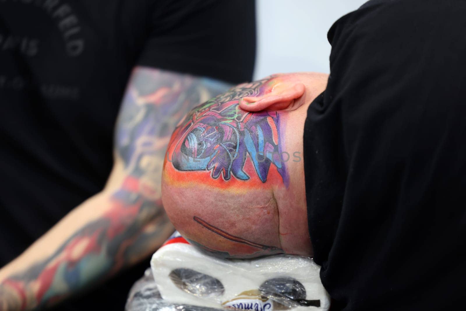 Krakow, Poland -  June 12, 2022: Unidentified  participant at 15th Tattoofest Convention in Cracow. One of the most prestigious tattoo festivals.