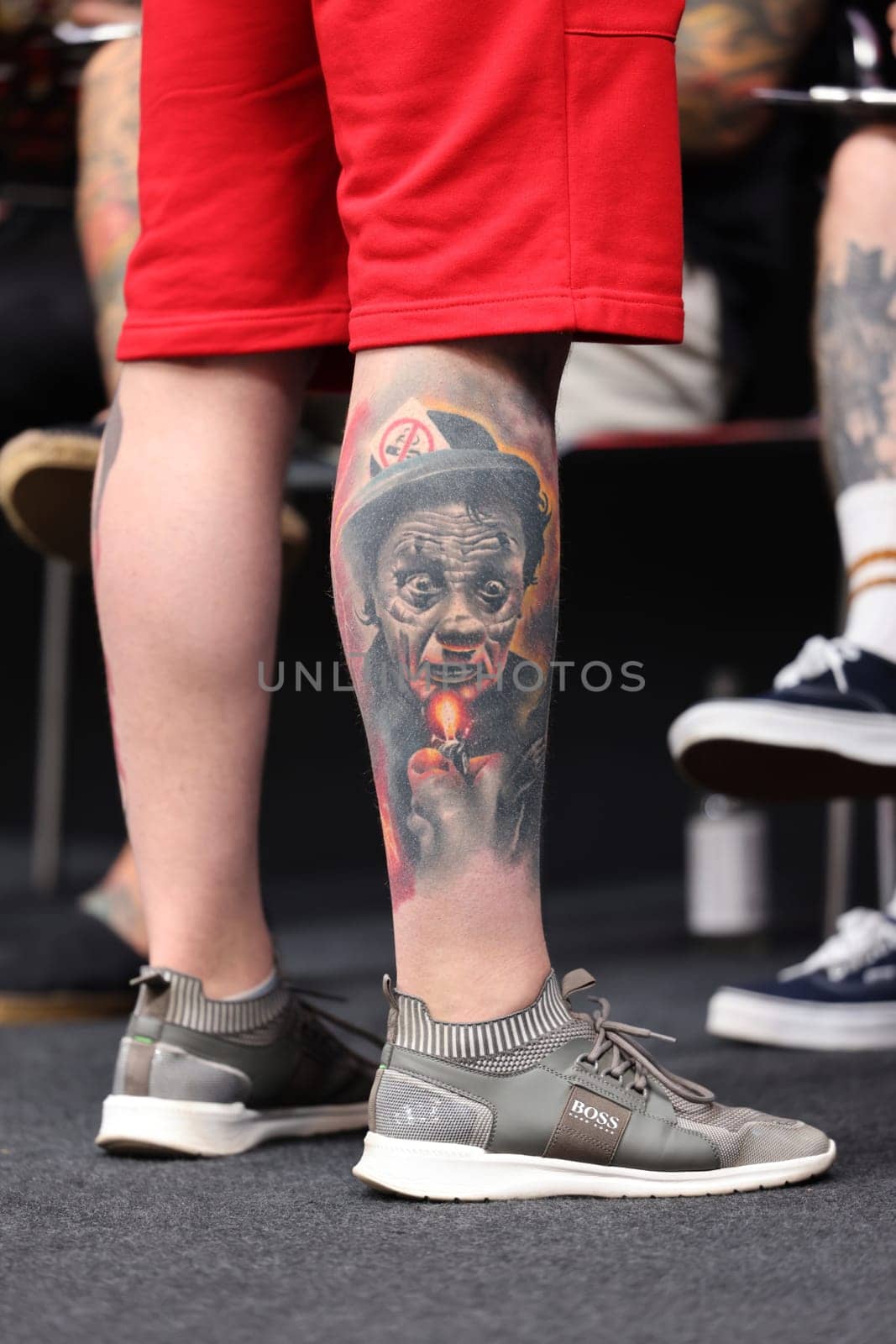Krakow, Poland - June 12, 2022: Unidentified participant during the contest for the best tattoo at the 15th Tattoofest Convention in Cracow. One of the most prestigious tattoo festivals.