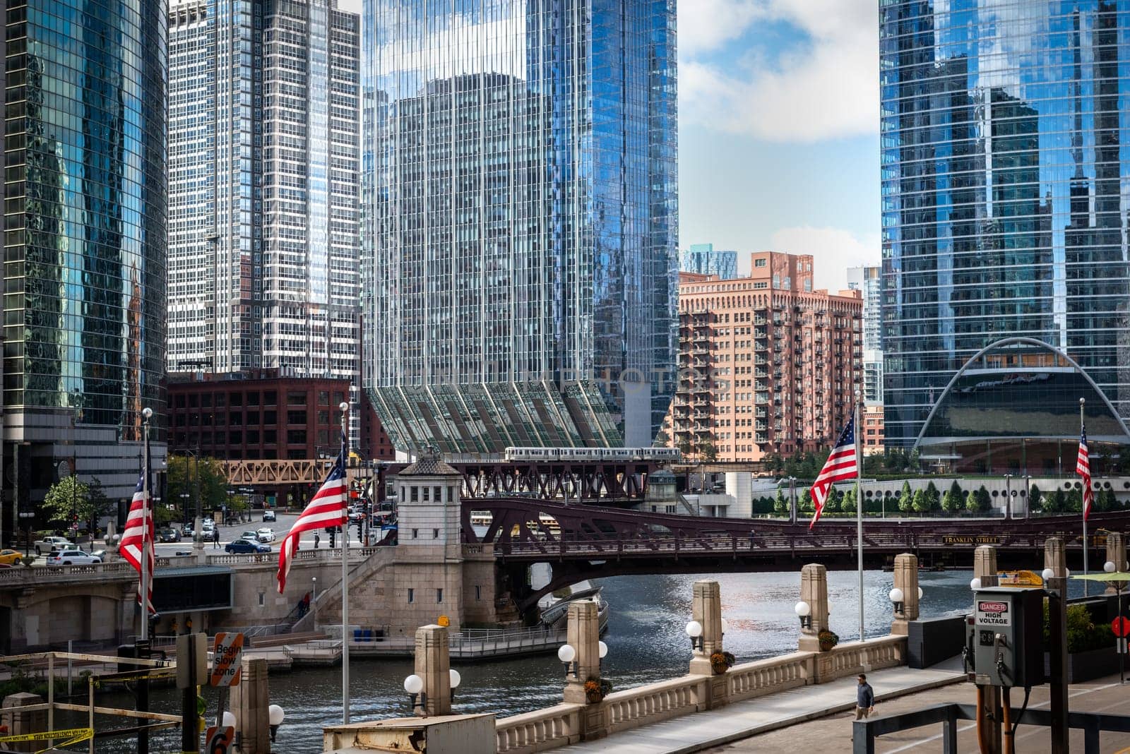 Chicago, Illinois, United States of America : October 11, 2018, Train on elevated tracks within buildings at the Loop, Glass and Steel bridge between buildings - Chicago City Center - Chicago, Illinois, USA