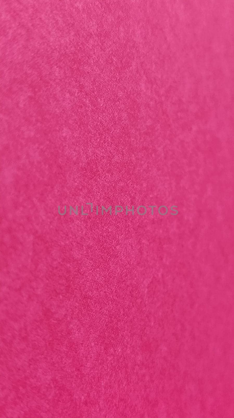 Beautiful fuchsia bright background. Scarlet, purple, uneven color. A sheet of colored paper with a soft fleecy texture
