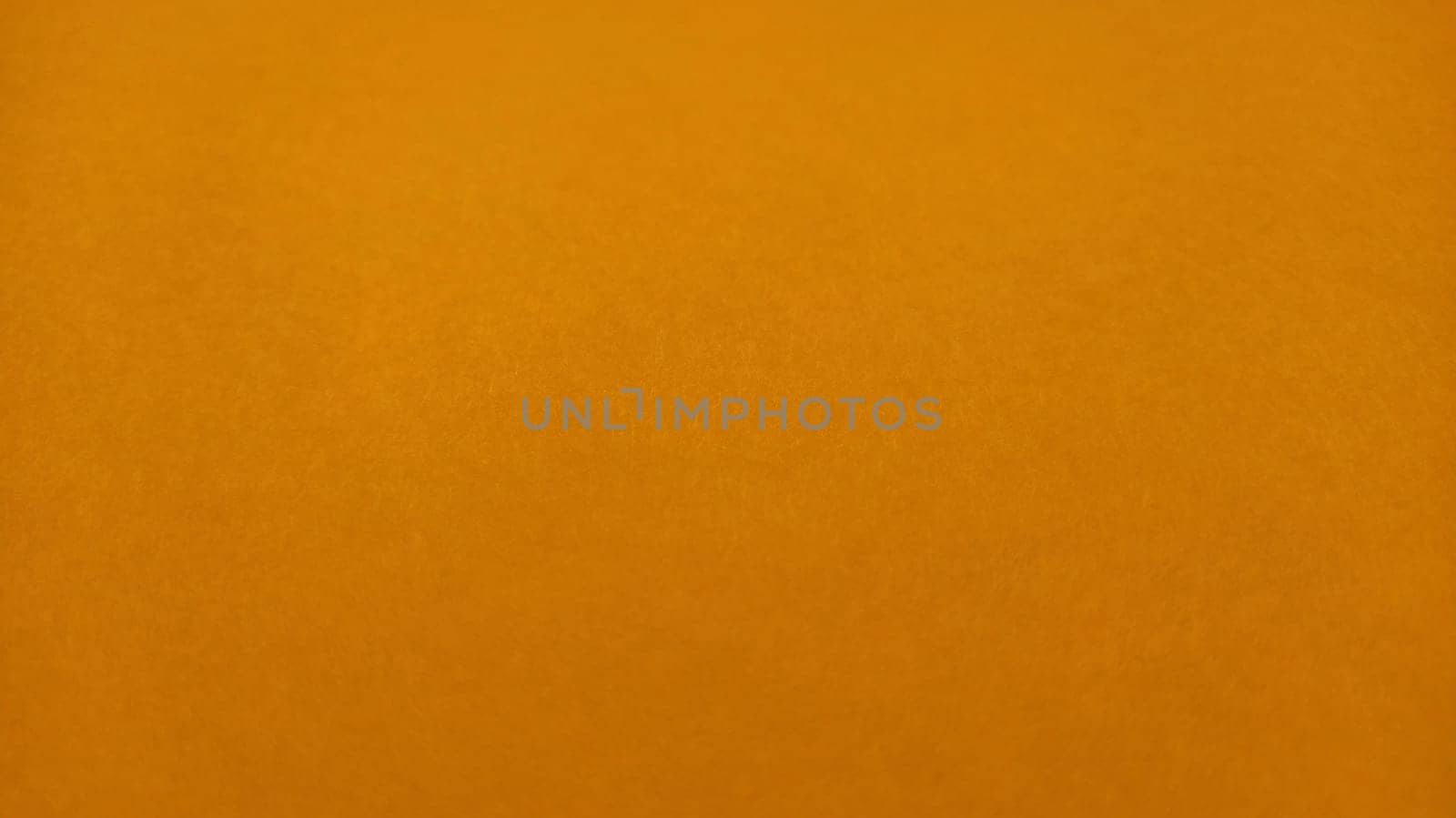 Orange background. Banner. Orange paper sheet with texture.