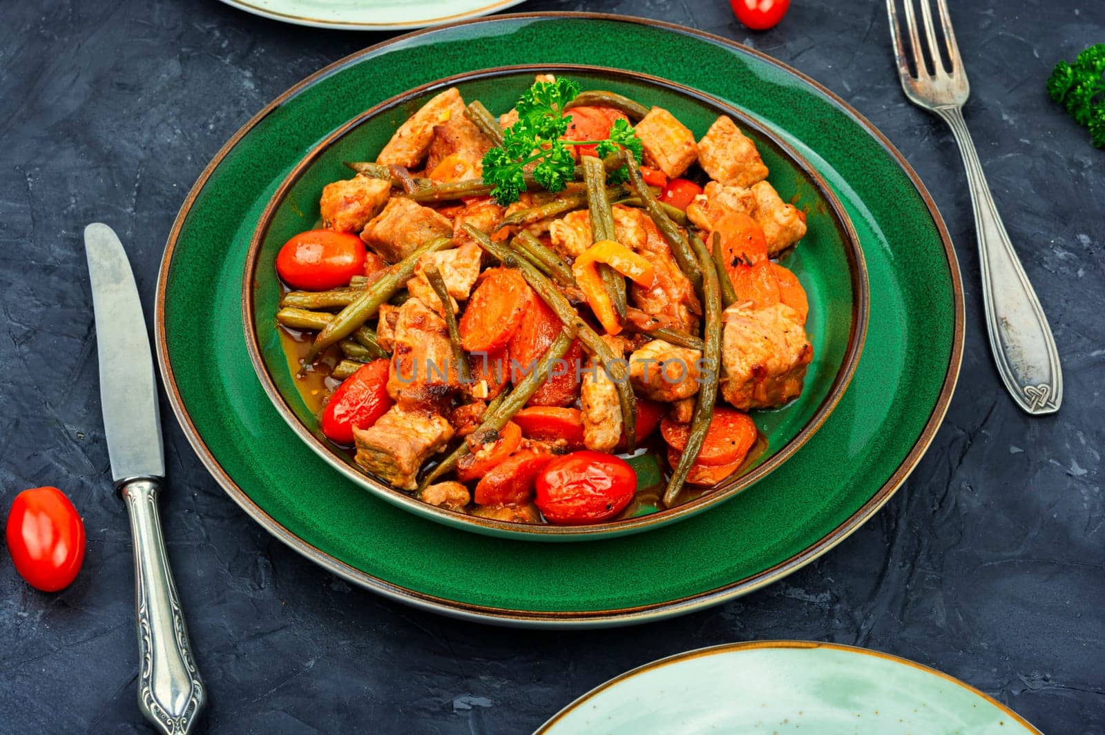 Stewed meat with carrots,tomatoes and french bean.Meat sauce with green beans.