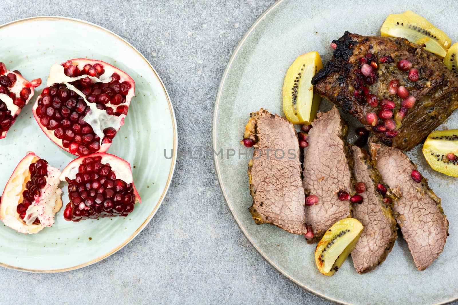 Veal meat roasted in fruit sauce. Top view