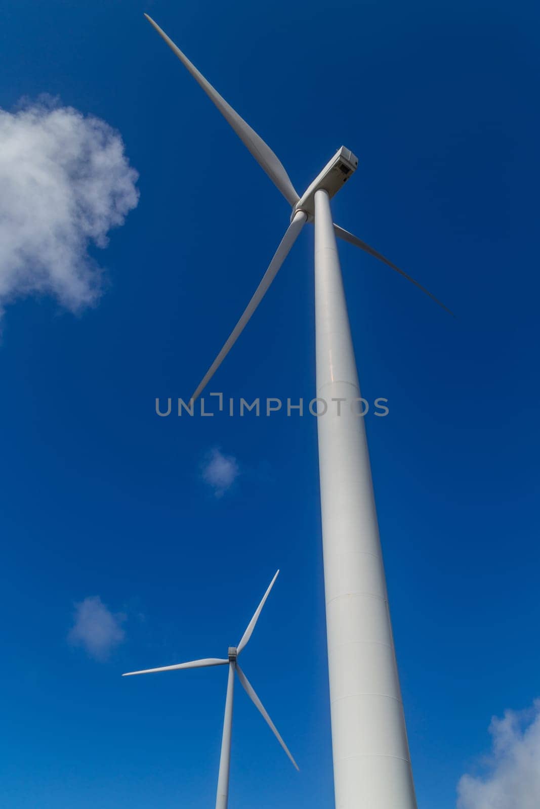 Wind turbine on blue sky in nature. Galiza, North of Spain