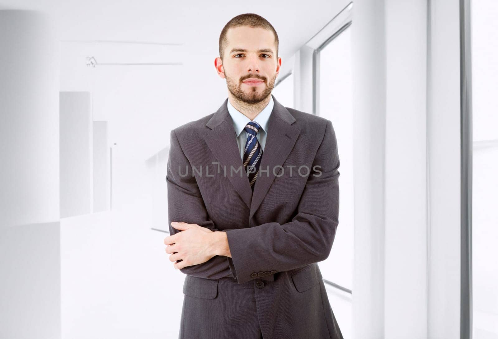young business man portrait at the office