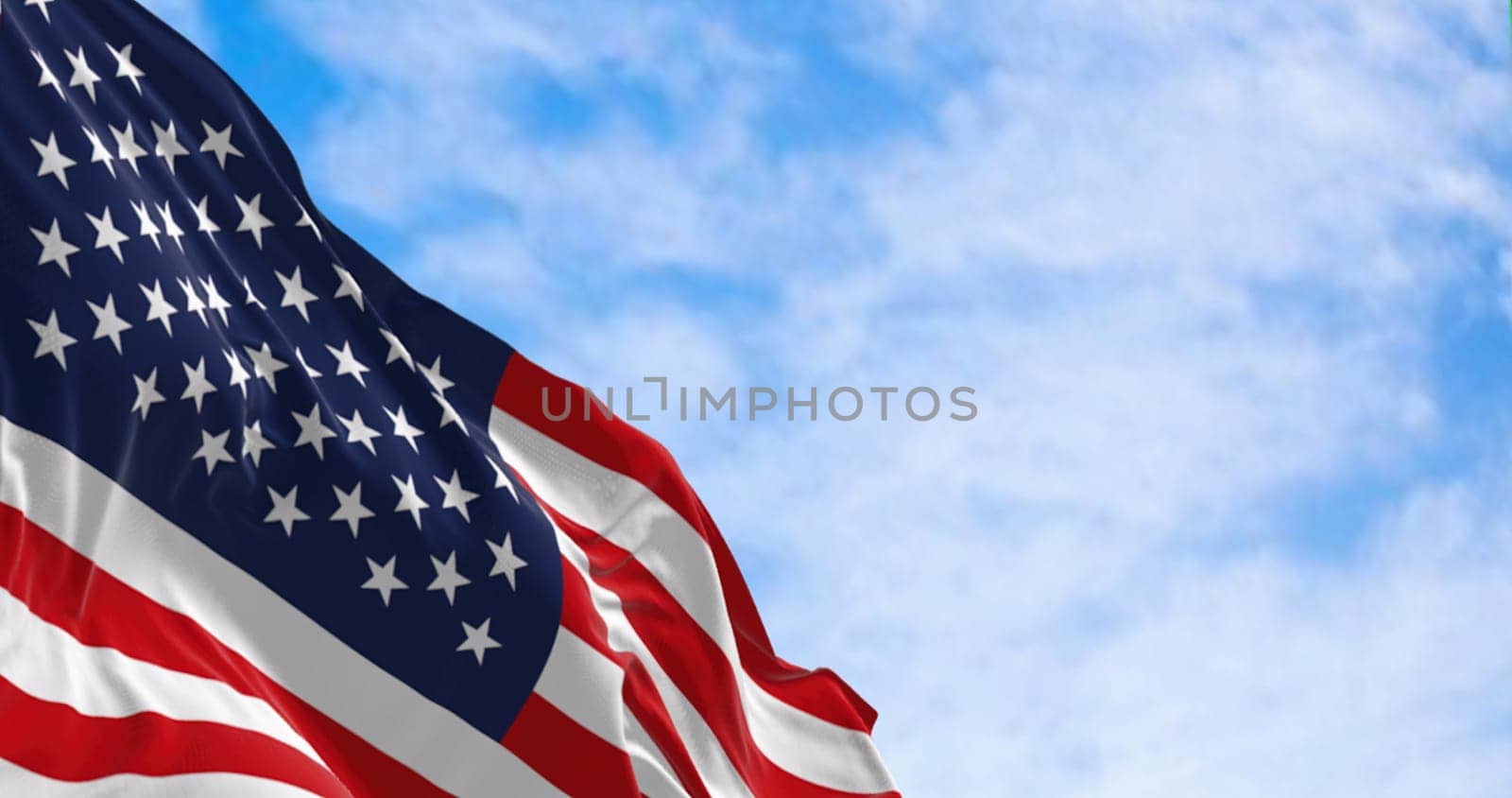 The flag of the United States of America waving on a sunny day. Stars and stripes flag. Symbol of democracy and patriotism. 3D illustration render. Rippled fabric