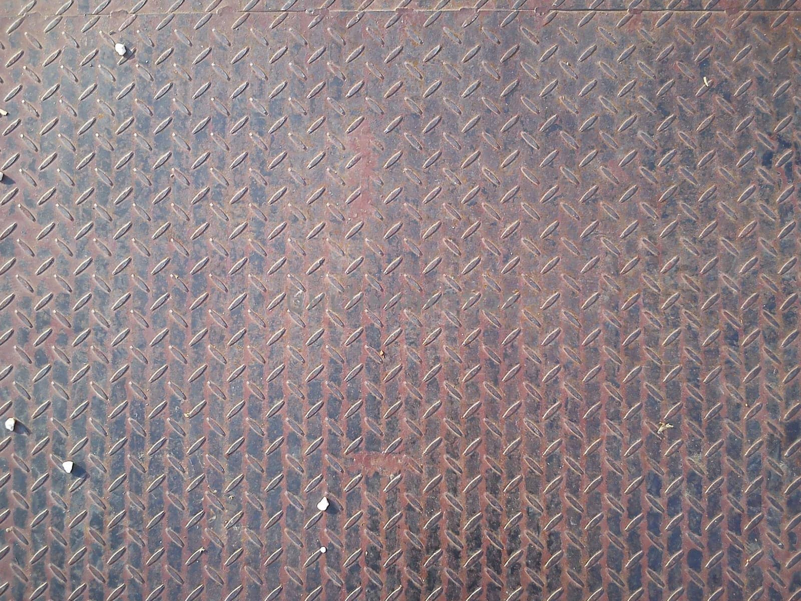 A chemically simple substance or alloy with a special sheen, ductility, good thermal conductivity and electrical conductivity. A metal bridge or step with a convex pattern against slipping shoes.