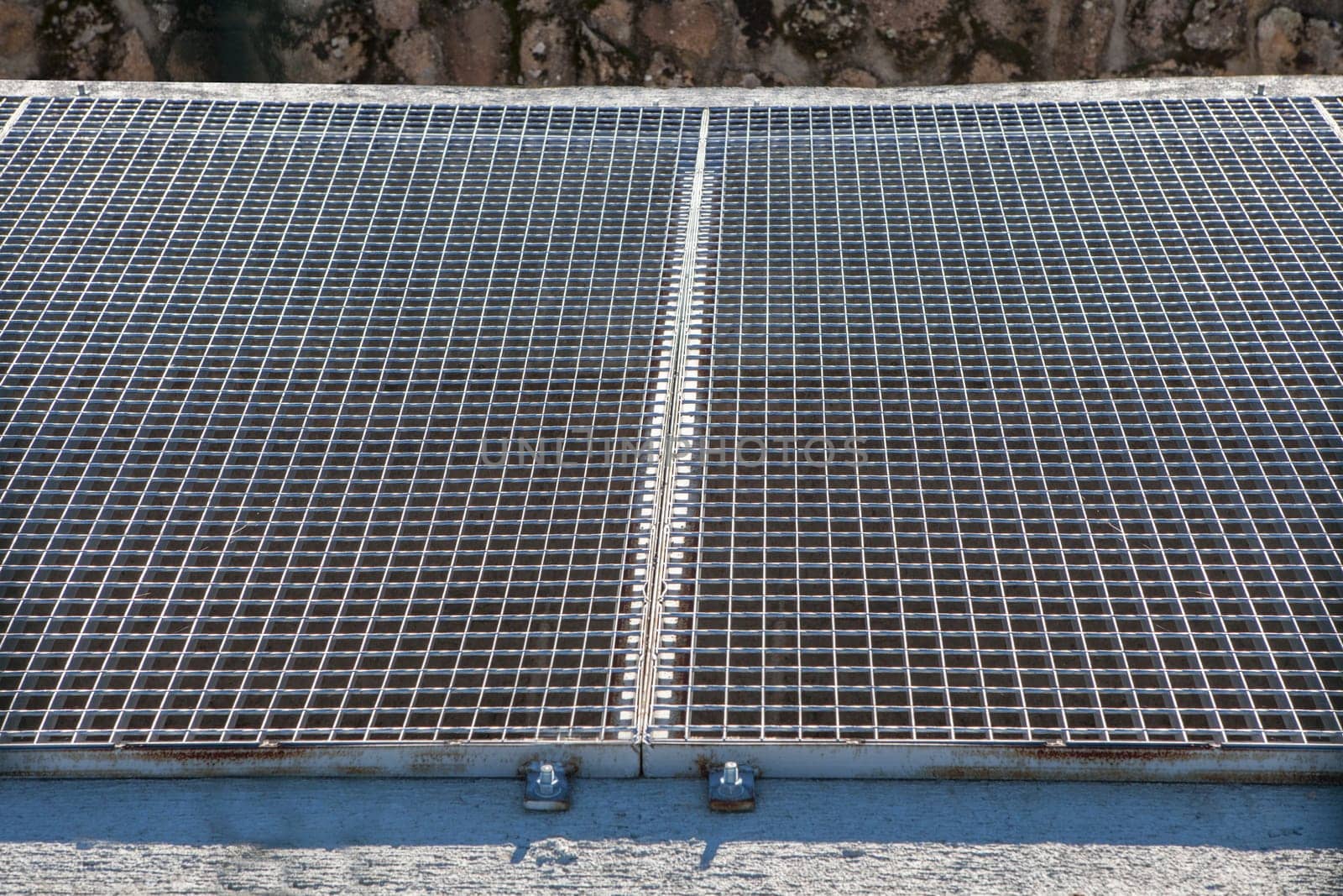 Galvanized steel floor grille. Selective focus