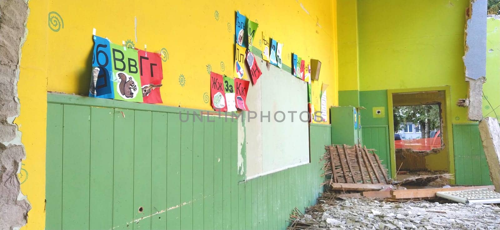 Sremska Mitrovica, Serbia, 13 August 2020. Dismantling and demolition of the old school named after Jovan Popovic. Holes in the walls and ceiling. Ruined classroom.