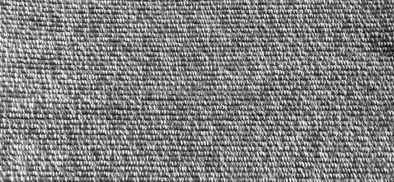 Woven coarse cotton fabric. Close-up. Black and white photography. Banner. Weaving thick threads. Smooth neat texture for the background