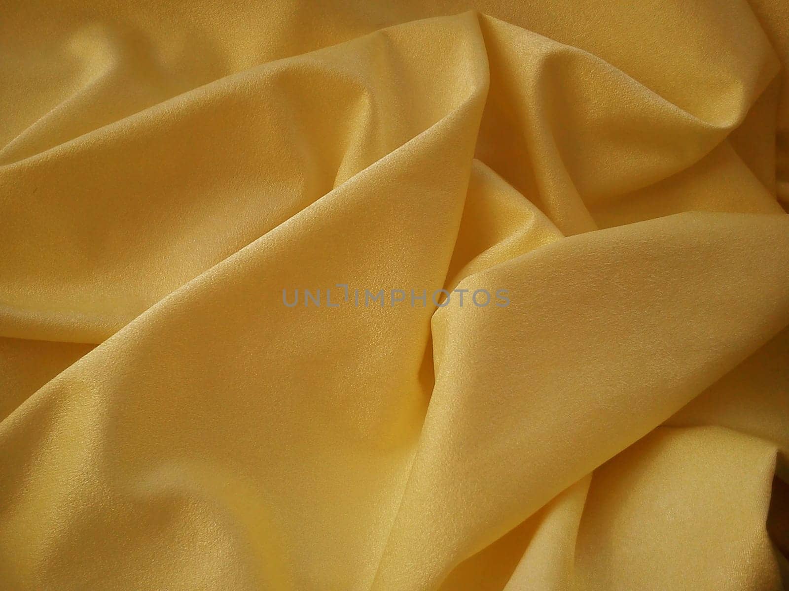 Beautiful velvet orange curtains. Light negligence when folding the material. Soft, soft-touch curtains for the room or kitchen. Fabric for sewing clothes.