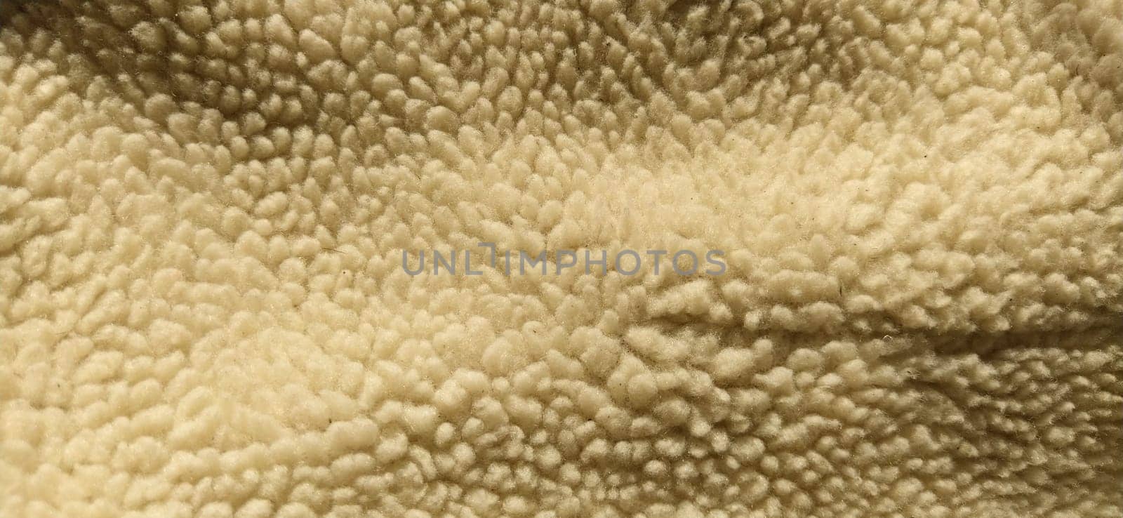 Sheepskin, sheep fur. The inner side of a coat or jacket, trimmed with natural or artificial sheep fur. Karakul as an element of winter outerwear