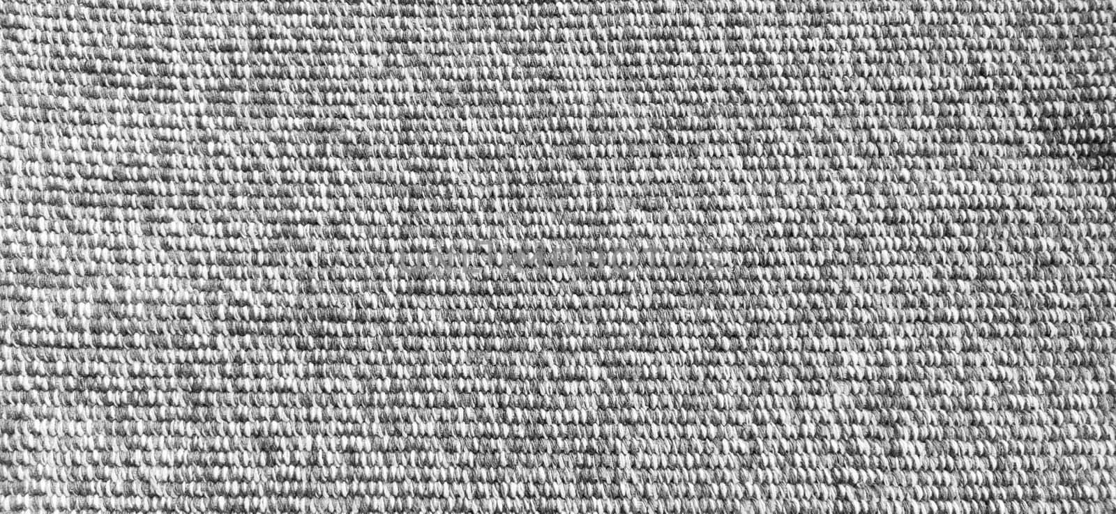 Woven coarse cotton fabric. Close-up. Black and white photography. Banner. Weaving thick threads. Smooth neat texture for the background.