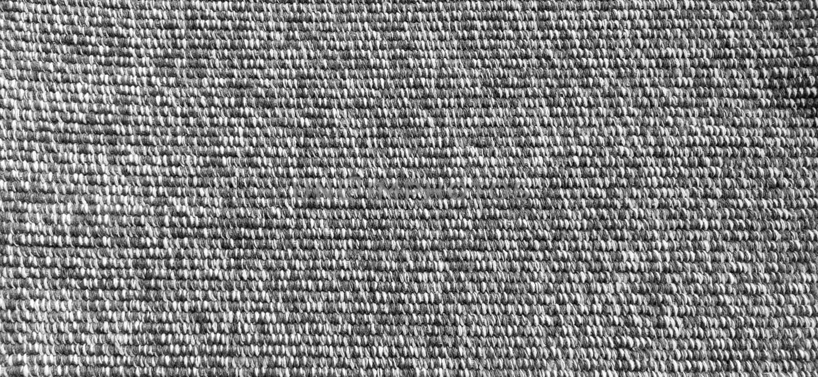 Woven coarse cotton fabric. Close-up. Black and white photography. Banner. Weaving thick threads. Smooth neat texture for the background