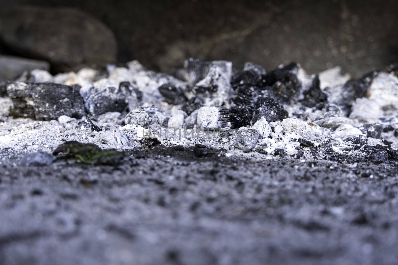 Detail of charcoal burned to grill food on a grill, party and celebration